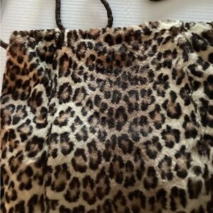 Vintage Muff. In good condition.In storage for years. One cord to be repaired.